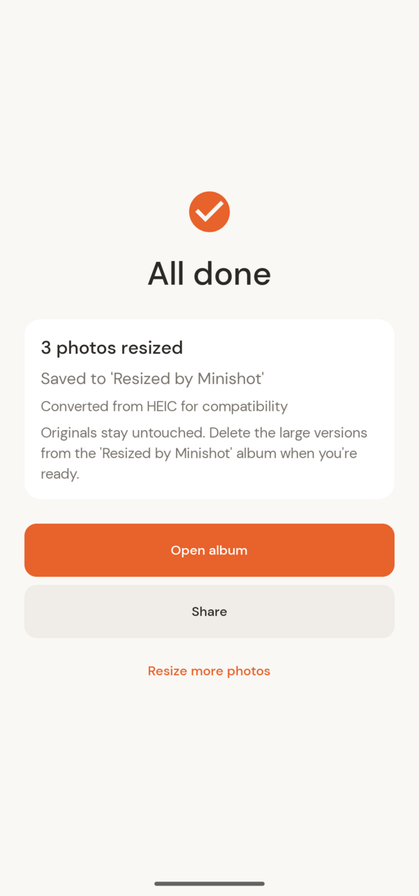 Minishot's all-done screen showing 3 photos resized and saved to the Resized by Minishot album.